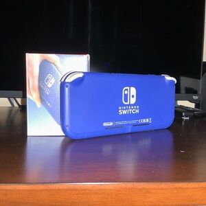Nintendo Switch Lite used with box. Scammers will be deleted and blocked.